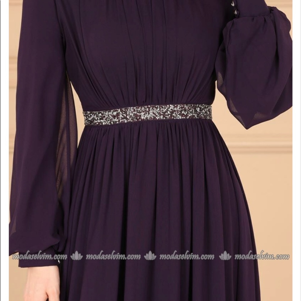 Dress with diamond belt.